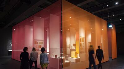 People walk in one of the exhibition halls of the new Bauhaus Museum in Dessau, Germany. AP photo