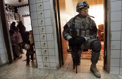 By 2006, US soldiers were searching house-to-house for weapons or other insurgency-related items in the Iraqi capital. Getty Images