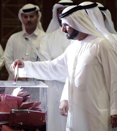 Sheikh Mohammed bin Rashid, Vice President and Ruler of Dubai, casts his vote in 2006. Photo by Karim Sahib / AFP