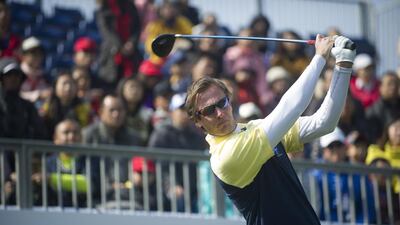 Nicolas Colsaerts tees off on Saturday in the second day of the Royal Trophy at the Dragon Lake Golf Club's Asian Games Course in Guangzhou, China. AFP Photo