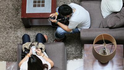 Fifty-seven per cent of all handsets registered on the country’s mobile networks are now smartphones, according to the Telecommunications Regulatory Authority. Antonie Robertson / The National