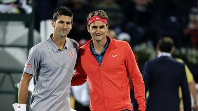 Novak Djokovic, left, and Roger Federer, right, have won 11 of the last 13 Dubai titles between them. Sarah Dea / The National