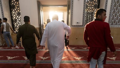 Worshippers gather for Eid Al Adha prayers at Al Farooq Omar bin Al Khattab Mosque in Al Safa, Dubai. Antonie Robertson / The National