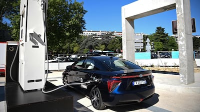With hydrogen fuel cell electric vehicles, a chemical reaction between powers an electric motor, with the exhaust pipe giving off water vapour. AFP