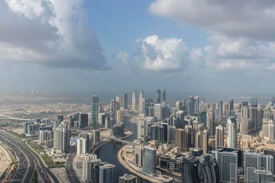 The UK's Business Secretary will emphasise Britain’s role in helping the UAE push ahead with its energy transition plans. Antonie Robertson/The National