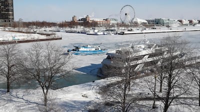 The James Versluis breaks ice on the frozen Chicago River near Navy Pier in Chicago. EPA