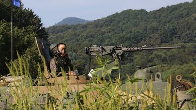 A South Korean army soldier mans a K-9 self-propelled howitzer as he prepares for a military exercise in Paju, South Korea, near the border with North Korea, Monday, Sept. 4, 2017. North Korea said it set off a hydrogen bomb Sunday in its sixth nuclear test, which judging by the earthquake it set off appeared to be its most powerful explosion yet. (AP Photo/Ahn Young-joon)