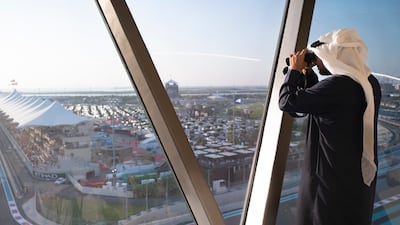 President Sheikh Mohamed watches the final race of the Formula 1 Etihad Airways Abu Dhabi Grand Prix 2023 from Shams Tower at Yas Marina Circuit. Hamad Al Kaabi / Presidential Court