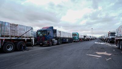 Aid trucks outside the Rafah border crossing on Sunday. EPA