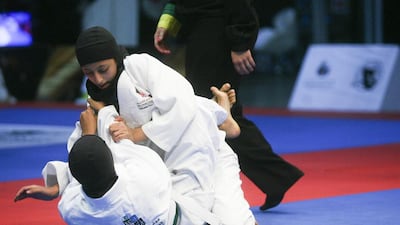 Sheikha Latifa Bint Juma Maktoum, bottom, battled Raghdad Al Erteqqa in the 45 kilo Finals category. Sheikha Maktoum would go on to win the fight. Lee Hoagland / The National