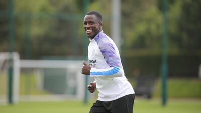 Manchester City's Benjamin Mendy smiles during training at Manchester City Football Academy in Manchester, England. Getty Images