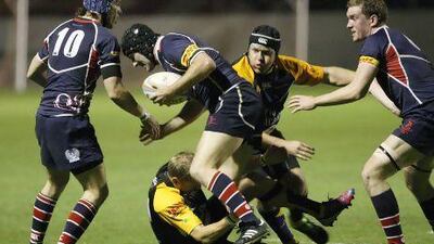 The Jebel Ali Dragons, in blue, ran past the Dubai Hurricanes, in yellow sleeves, to solidify their hold on second place in the Gulf Top Six.