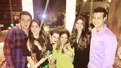 Sridevi is seated with Dubai resident Rekha Tourani during a visit to the UAE. (L to R) Rekha's son Dusty Tourani, Sridevi's daughters Janhvi and Khushi, and Rekha's son Tubby Tourani. Courtesy Rekha Tourani