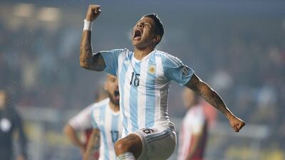 Marcos Rojo of Argentina celebrates his opening goal for his side on Tuesday night against Paraguay. Carlos Succo / EPA