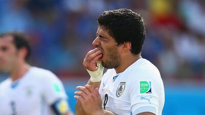 Uruguay's Luis Suarez has courted trouble again. Clive Rose / Getty Images