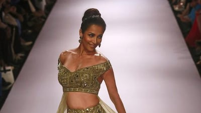 Bollywood actress Malaika Arora Khan wears an Arpita Mehta creation during the Lakmé Fashion Week in Mumbai. Rafiq Maqbool / AP Photo