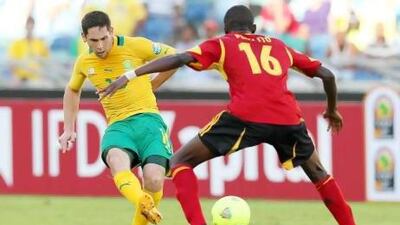 Dean Furman, right, earned praise from Bafana Bafana legend Steven Pienaar for his assured and controlled display in midfield for South Africa in their game against Angola. Anesh Debiky / Getty Images