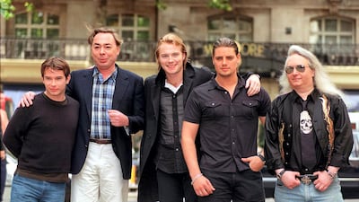 Stephen Gately, Andrew Lloyd Webber, Ronan Keating, Keith Duffy and Jim Steinman in London, celebrating Boyzone's new single 'No Matter What' reaching No. 1. Reuters