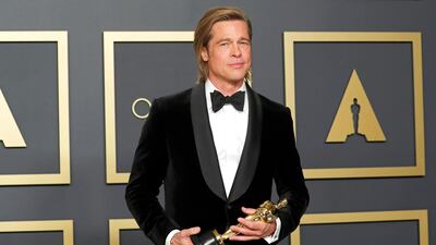 Best Supporting Actor Brad Pitt poses with the Oscar in the photo room during the 92nd Academy Awards in Hollywood. Reuters
