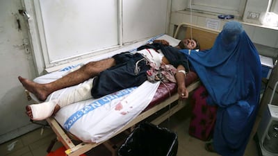 A man who was injured in militants attack, receives medical treatment at a hospital in Jalalabad, Afghanistan, on May 13, 2018. Ghulamullah Habibi / EPA