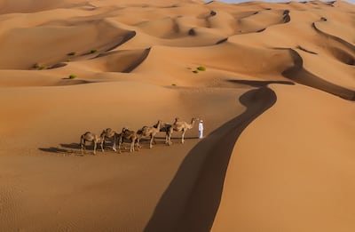 Camel trekking in the desert is available for guests. Photo: Anantara