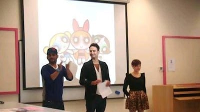 The Powerpuff Girls form a backdrop to a presentation by DJ Bliss, left, Heriot-Watt fashion lecturer Anton Storey and Simone Heng ahead of this evening's Powerpuff Girls' Fashion Party.