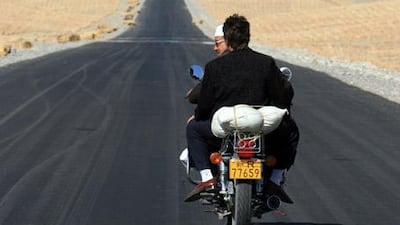 A road in Xinjiang: China has expanded its highways to build industrial capacity, but a culture of mobility has arisen as well.