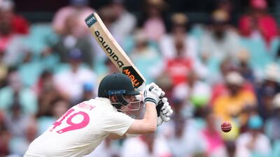 Australian cricketer Steve Smith is hit by the ball during day two of the third Test match with South Africa in Sydney. AFP