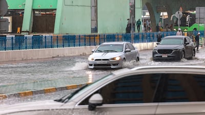 Motorists in Abu Dhabi and elsewhere have been asked to take extra care in the hazardous conditions. Victor Besa / The National