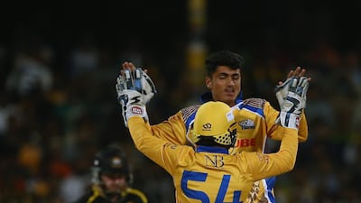 Mujeeb Zadran and Sarfraz Ahmed of Bengal Tigers celebrate the wicket of Eoin Morgan of Kerela Kings. Francois Nel/Getty Images
