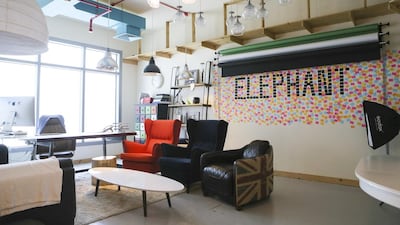 Elephant Nation's office space has sofa beds, bright lights and vibrant colours instead of standard office furniture. Sarah Dea / The National