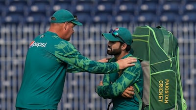 Pakistan's team director Mickey Arthur with Mohammad Rizwan during training in Chennai. AP