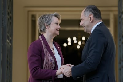 Yvette Cooper with the Greek Foreign Minister George Gerapetritis in Athens. AP