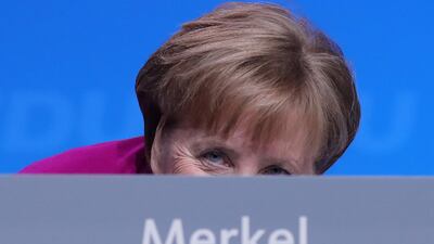Angela Merkel returns to her seat after addressing the CDU party conference in Berlin, Germany, February 26, 2018. Bloomberg