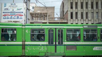 Commuters pack out a tram during rush hour in downtown Tunis, Tunisia. AP Photo