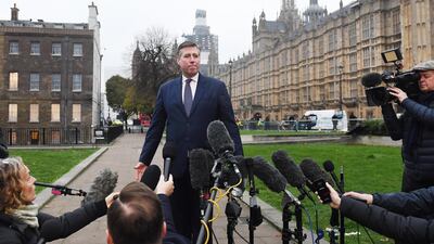 The Chairman of the 1922 Committee, Sir Graham Brady, speaks to the media outside parliament in London, 12 December 2018. EPA