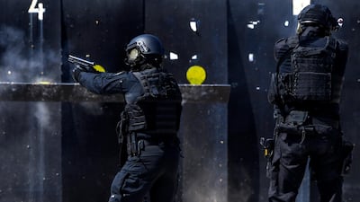 Police killed one of several gunmen in an exchange of fire on Tuesday after they broke into Albania's international airport and drove away with a shipment of money. EPA