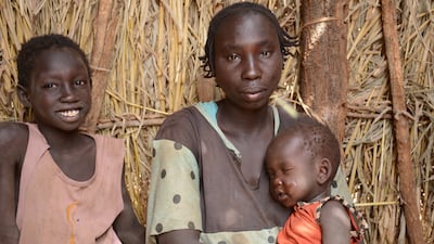 Asia Talah Brasham, 32, who fled Kadugli in December with her four young children after their home was blown up, at Thobo Camp, in Engpung County, Sudan, on January 29. Reuters