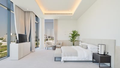 A bedroom with golf course views. Courtesy Luxhabitat Sotheby's International Realty