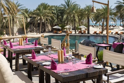 Summer House's outdoor seating overlooks the waters. Photo: Six Senses Zighy Bay