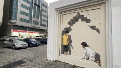 Ernest Zacharevic animates public spaces with interactive murals depicting children at play. Courtesy Department of Municipalities and Transport