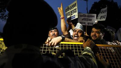 Activists and supporters of India's Aam Aadmi Party (APP) shout anti-Pakistani slogans during a protest as they try to march towards the Pakistani High Commission in New Delhi. Sajjad Hussain / AFP