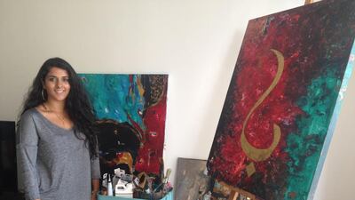 Shazeaa Ingar standing next to The Letter Baa, a piece from her collection Al Harf (Courtesy: Aleena Jan Khan)