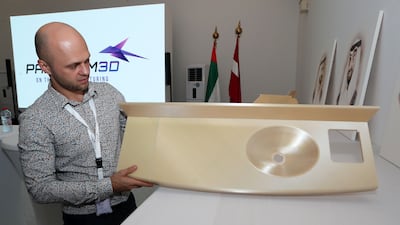 Mr Senivs with a printed plane made from polymer