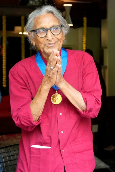 Balkrishna Doshi receives the Royal Gold Medal 2022 from the Royal Institute of British Architects at his residence in Ahmedabad, India, on May 10, 2022. AP Photo