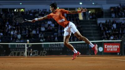 Novak Djokovic stretches for a return during the Italian Open semi-final against Casper Ruud. Getty