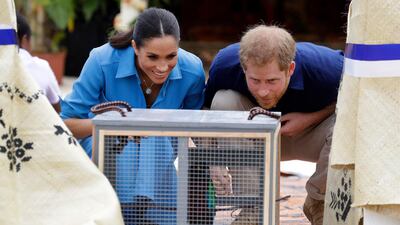 Prince Harry, Duke of Sussex and Meghan, Duchess of Sussex during a visit to Tupou College in Tonga. Getty Images