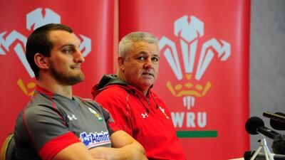Wales captain Sam Warburton, left, and coach Warren Gatland face the press during the Wales team announcement on February 19, 2014. Stu Forster / Getty Images
