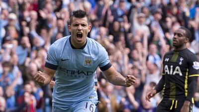 Manchester City's Sergio Aguero celebrates scoring one of his four goals against Tottenham Hotspur on Saturday in a Premier League victory. Oli Scarff / AFP / October 18, 2014