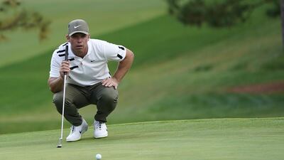 Clubhouse leader Paul Casey lines up his putt on the seventh hole. EPA